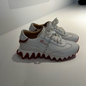 Loubutin sneackers us9. Worn just once. Box and dust bag